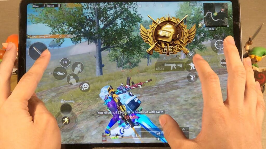 pubg mobile control codes with 6 finger claw player holding phone with six fingers on PUBG Mobile screen